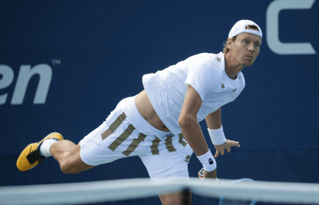 Aug 26, 2019; Flushing, NY, USA; Tomas Berdych of Czech Republic serves against Jenson Brooksby of the United States in a first round match on day one of the 2019 U.S. Open tennis tournament at USTA Billie Jean King National Tennis Center. Mandatory Credit: Jerry Lai-Imagn Images