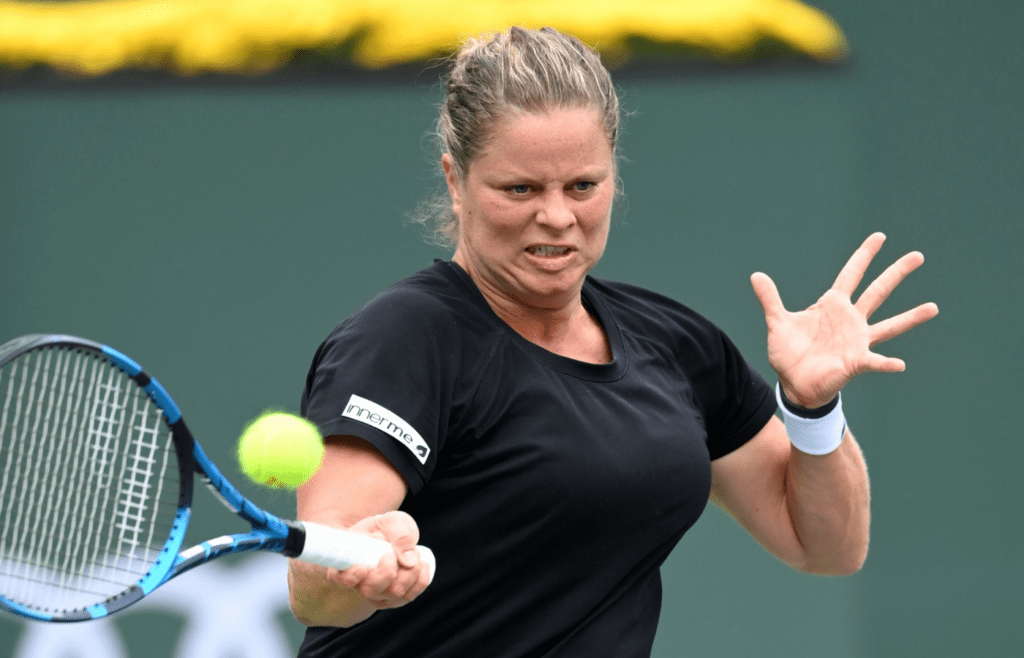 Oct 7, 2021; Indian Wells, CA, USA; Kim Clijsters (BEL) hits a shot in her first round match against Katerina Siniakova (CZE) in the BNP Paribas Open at the Indian Wells Tennis Garden. Mandatory Credit: Jayne Kamin-Oncea-Imagn Images