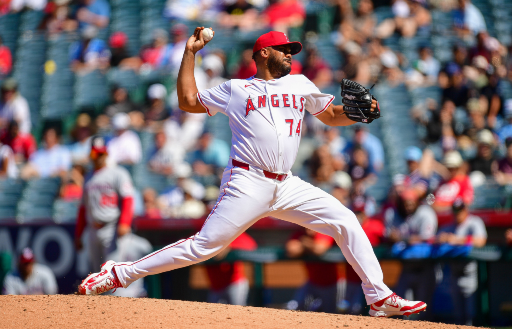 Jun 29, 2025; Anaheim, California, USA; Los Angeles Angels pitcher Kenley Jansen (74) throws against the Washington Nationals during the ninth inning at Angel Stadium. Mandatory Credit: Gary A. Vasquez-Imagn Images
