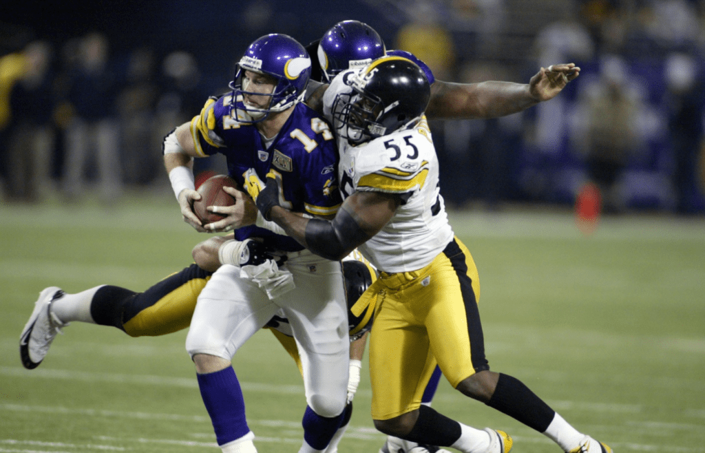 Dec. 18, 2005; Minneapolis, MN, USA; Pittsburgh Steelers linebacker (55) Joey Porter wraps his arms around Minnesota Vikings quarterback (14) Brad Johnson for a 4-yard loss in the second quarter at the Metrodome. Mandatory Credit: Photo By Bruce Kluckhohn-Imagn Images Copyright (c) 2005 Bruce Kluckhohn
