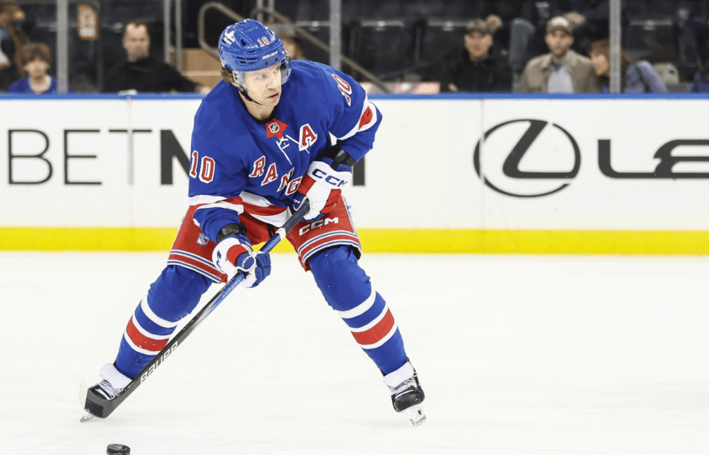 Apr 17, 2025; New York, New York, USA; New York Rangers left wing Artemi Panarin (10) attempts a shot on goal in the third period against the Tampa Bay Lightning at Madison Square Garden. Mandatory Credit: Wendell Cruz-Imagn Images