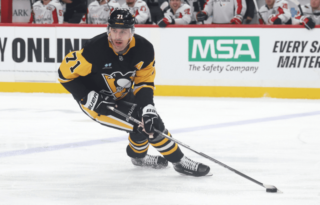 Apr 17, 2025; Pittsburgh, Pennsylvania, USA; Pittsburgh Penguins center Evgeni Malkin (71) skates with the puck against the Washington Capitals during the second period at PPG Paints Arena. Mandatory Credit: Charles LeClaire-Imagn Images