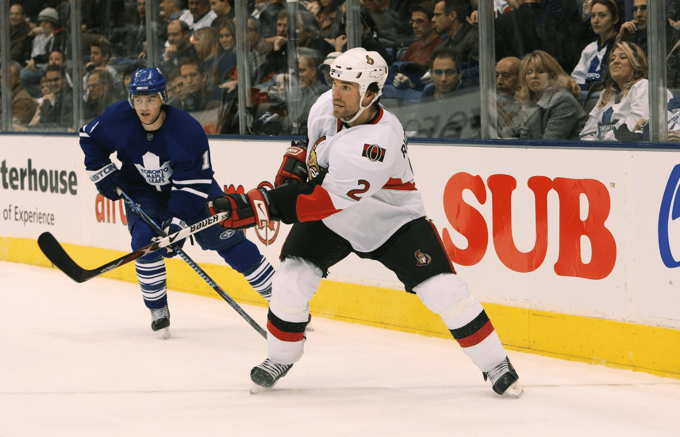 Nov 17, 2007; Toronto, ON, Canada; Ottawa Luke Richardson (2) plays the puck against the Toronto Maple Leafs at the Air Canada Centre in Toronto, ON. Mandatory Credit: Tom Szczerbowski-Imagn Images