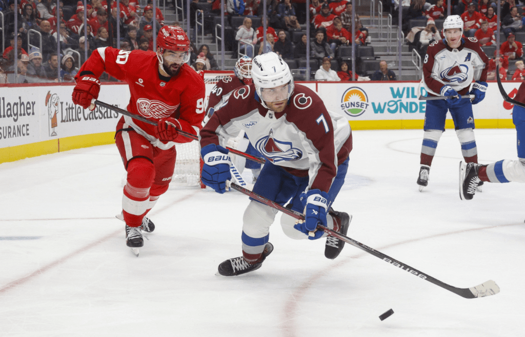 Dec 7, 2024; Detroit, Michigan, USA; Colorado Avalanche defenseman Devon Toews (7) handles the puck against the Detroit Red Wings during the second period at Little Caesars Arena. Mandatory Credit: Brian Bradshaw Sevald-Imagn
