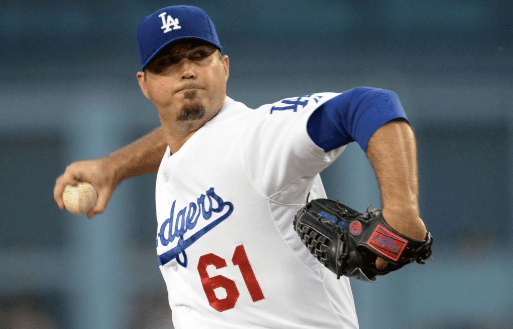 Jul 29, 2014; Los Angeles, CA, USA; Los Angeles Dodgers starting pitcher Josh Beckett (61) in the second inning of the game against the Atlanta Braves at Dodger Stadium. Mandatory Credit: Jayne Kamin-Oncea-Imagn Images