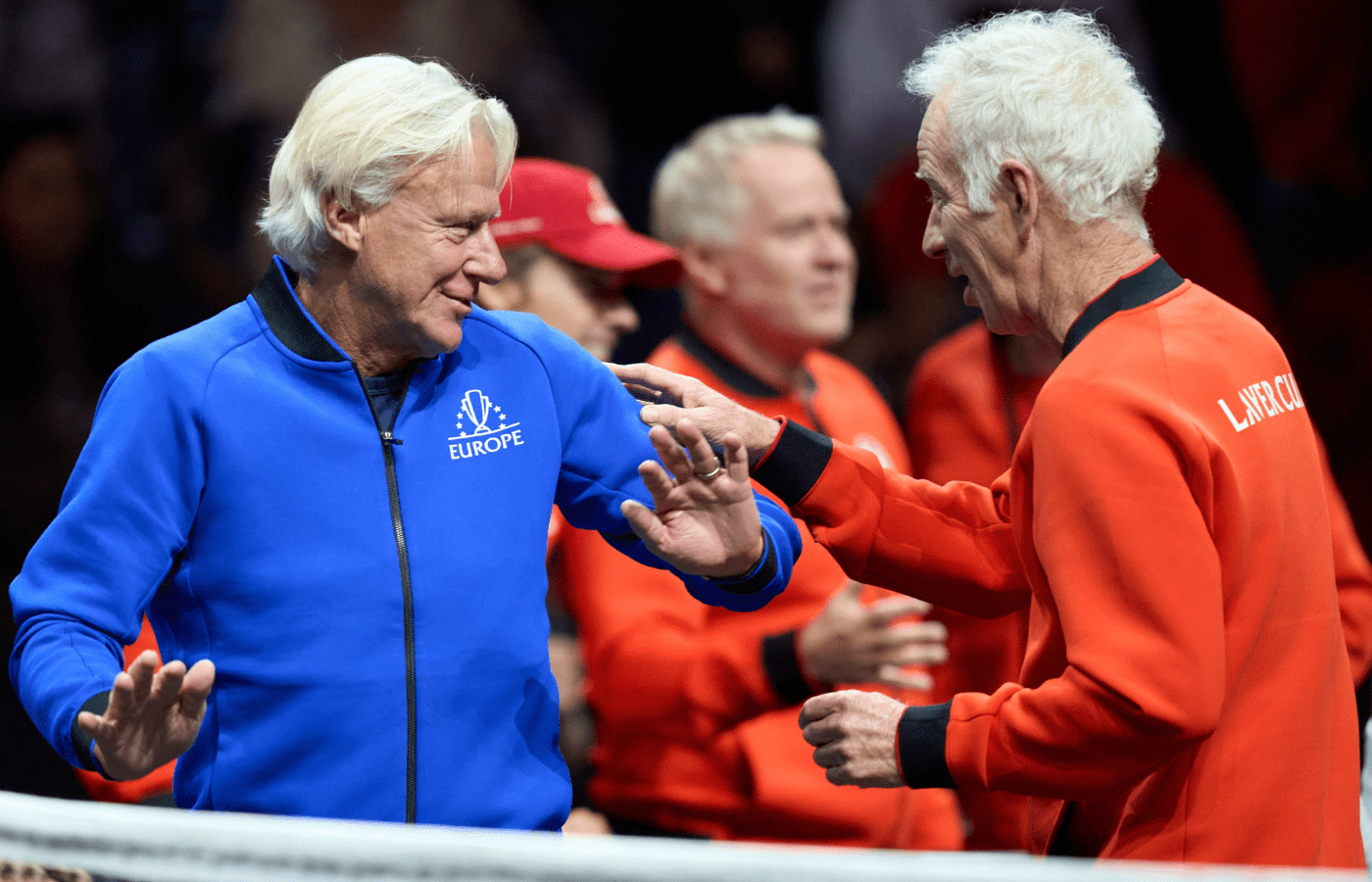 Sep 25, 2022; London, United Kingdom; Team World and Team Europe captains John McEnroe and Bjorn Borg meet as Felix Auger-Aliassime (CAN) beats Novak Djokovic (SRB) in a Laver Cup singles match. Mandatory Credit: Peter van den Berg-Imagn Images