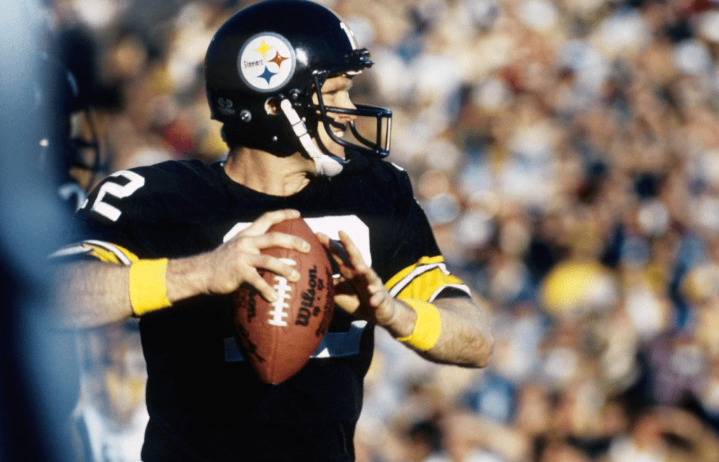 Jan 20, 1980; Pasadena, CA, USA; FILE PHOTO; Pittsburgh Steelers quarterback Terry Bradshaw (12) in action against the Los Angeles Rams during Super Bowl XIV at the Rose Bowl. The Steelers defeated the Rams 31-19. Mandatory Credit: Darryl Norenberg-Imagn Images