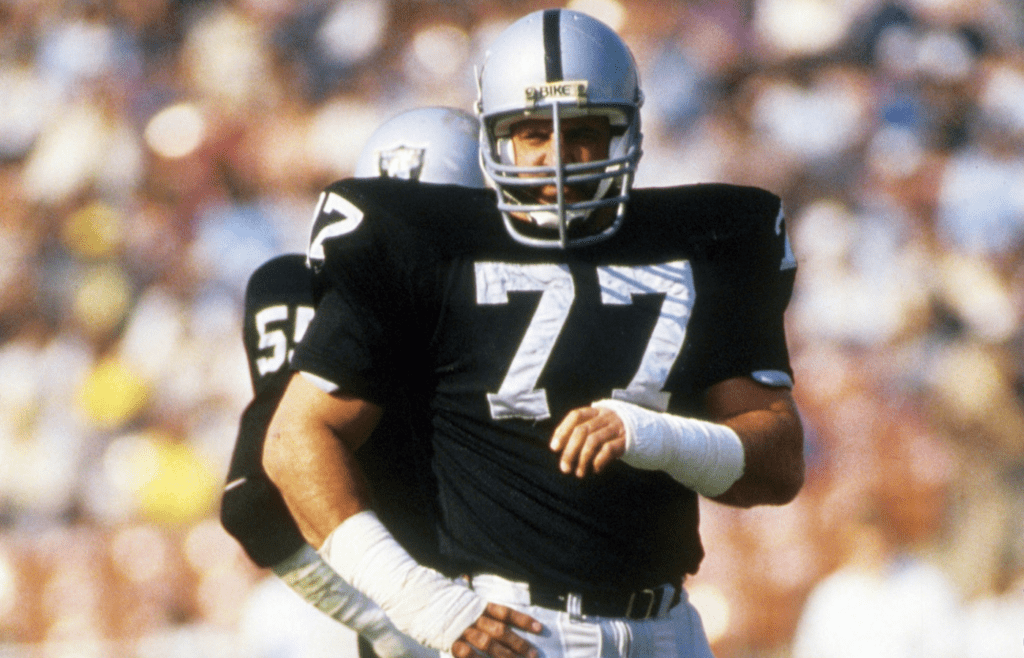 Dec 5, 1982; Los Angeles, CA, USA: FILE PHOTO; Los Angeles Raiders defensive tackle Lyle Alzado (77) against the Seattle Seahawks at the Los Angeles Memorial Coliseum. Mandatory Credit: Long Photography-Imagn Images