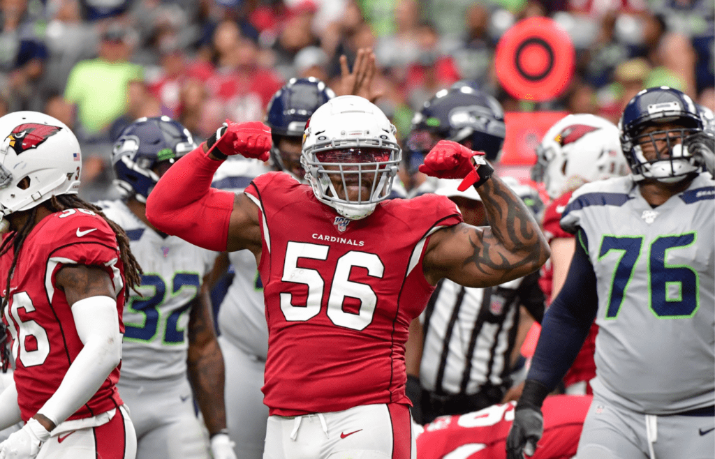 Sep 29, 2019; Glendale, AZ, USA; Arizona Cardinals outside linebacker Terrell Suggs (56) celebrates after sacking Seattle Seahawks quarterback Russell Wilson (3) in the first half at State Farm Stadium. Mandatory Credit: Matt Kartozian-Imagn Images