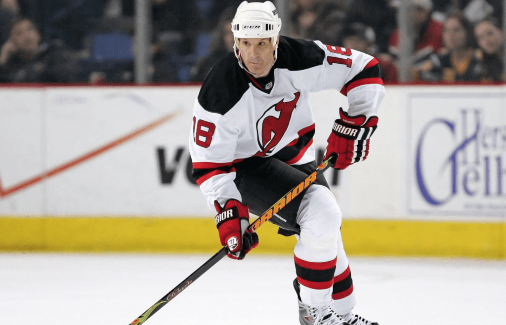 Apr 4, 2009; Buffalo, NY, USA; New Jersey Devils left wing Brendan Shanahan (18) carries the puck into the Buffalo Sabres zone at the HSBC Arena. Mandatory Credit: Kevin Hoffman-Imagn Images