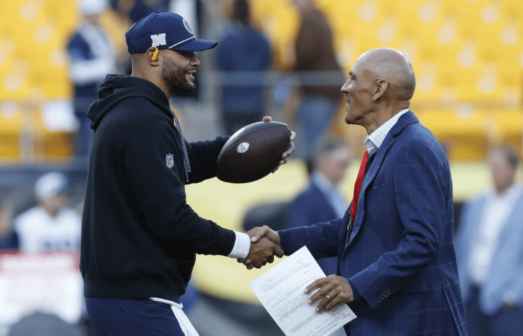 Oct 6, 2024; Pittsburgh, Pennsylvania, USA; Dallas Cowboys quarterback Dak Prescott (4) greets NFL Pro Football Hall of Fame coach Tony Dungy before the game against the Pittsburgh Steelers at Acrisure Stadium. Mandatory Credit: Charles LeClaire-Imagn Images