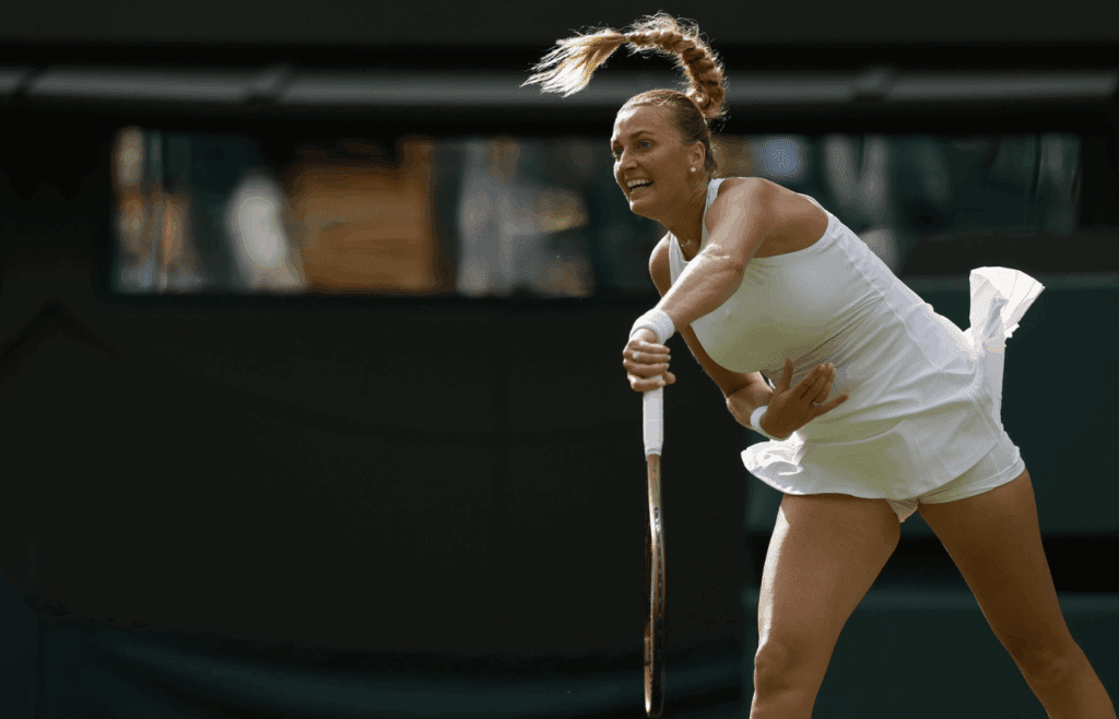Jul 1, 2025; Wimbledon United Kingdom; Petra Kvitova (CZE) serves against Emma Navarro (USA)(not pictured) on day 2 of The Championships, Wimbledon 2025 at All England Lawn Tennis and Croquet Club. Mandatory Credit: Geoff Burke-Imagn Images