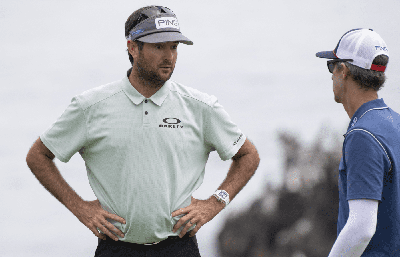 Jun 11, 2019; Pebble Beach, CA, USA; Bubba Watson talks with his caddie Ted Scott on the eighth green during a practice round of the 2019 U.S. Open golf tournament at Pebble Beach Golf Links. Mandatory Credit: Michael Madrid-Imagn Images