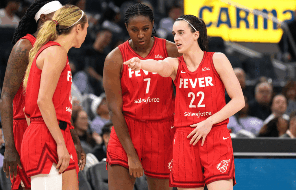 Jun 19, 2025; San Francisco, California, USA; Indiana Fever guard Caitlin Clark (22) talks to teammates during the third quarter against the Golden State Valkyries at Chase Center. Mandatory Credit: Darren Yamashita-Imagn Images