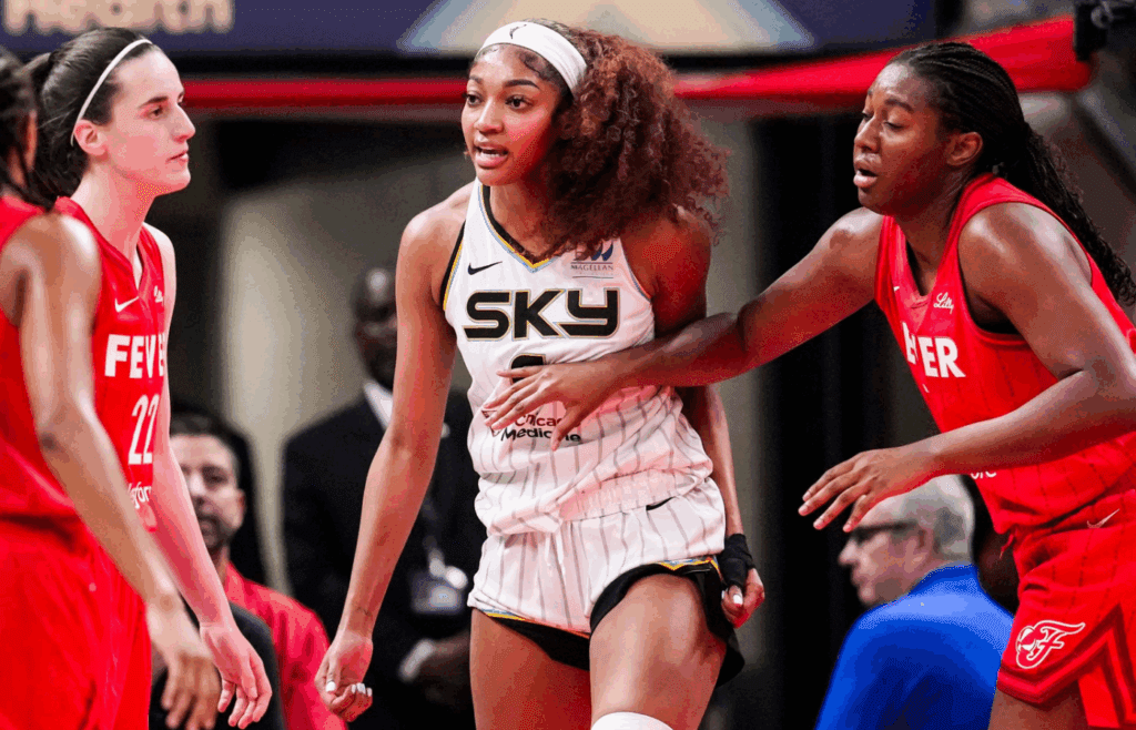 Indiana Fever guard Caitlin Clark commits a flagrant foul on Chicago Sky forward Angel Reese, who reacts during their game on Saturday, May 17, 2025, at Gainbridge Fieldhouse in Indianapolis.