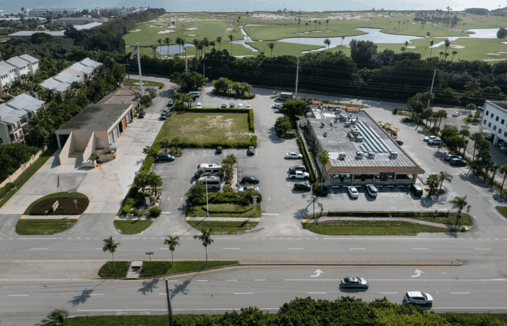A developer has proposed building a tower of 30 condos on one of the last vacant parcels between U.S. 1, bottom, opposite Seminole Golf Club, top, in Juno Beach, Florida on October 7, 2021.