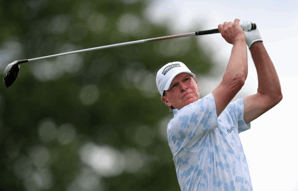 Steve Stricker watches his shot from the tee on the eighth hole during the first round of the Kaulig Companies Championship at Firestone Country Club, Thursday, July 11, 2024, in Akron, Ohio.