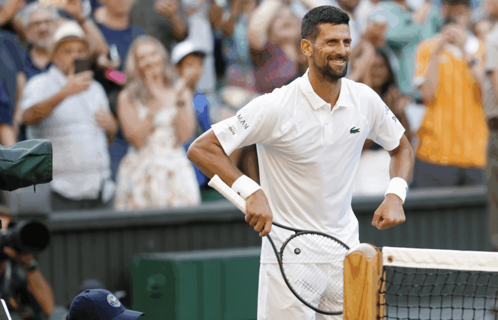 Jul 9, 2025; Wimbledon, United Kingdom; Novak Djokovic (SRB) dances on the court towards his daughter in the player's box after his match against Flavio Cobolli (ITA)(not pictured) in a gentlemen's singles quarter-final on day ten of these Championships Wimbledon 2025 at All England Lawn Tennis and Croquet Club. Mandatory Credit: Geoff Burke-Imagn Images