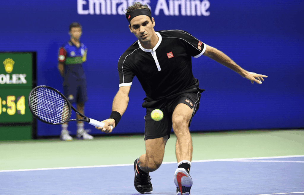 Sep 3, 2019; Flushing, NY, USA; Roger Federer of Switzerland hits to Grigor Dimitrov of Bulgaria in a quarterfinal match on day nine of the 2019 US Open tennis tournament at USTA Billie Jean King National Tennis Center. Mandatory Credit: Danielle Parhizkaran-Imagn Images
