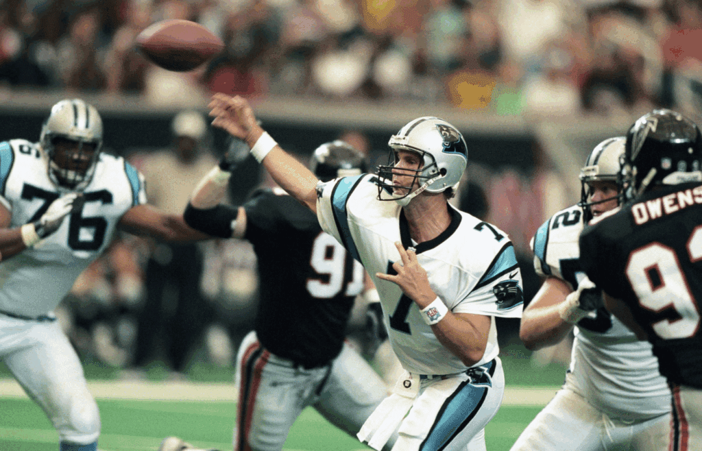 Sep 7, 1997; Atlanta, GA, USA; FILE PHOTO; Carolina Panthers quarterback Steve Beuerlein (7) throws the ball against the Atlanta Falcons during the 1997 season at the Georgia Dome. Mandatory Credit: RVR Photos-Imagn Images