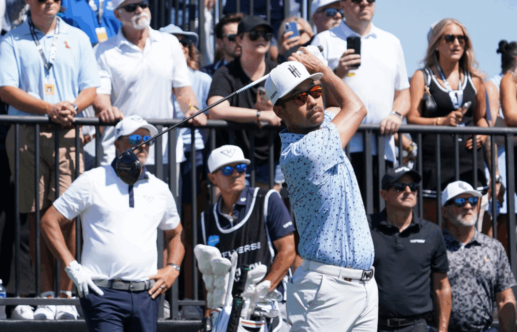 Jun 27, 2025; Carrollton, Texas, USA; Kevin Na plays his shot from the first tee during the first round of the LIV Golf Dallas golf tournament at Maridoe Golf Club. Mandatory Credit: Raymond Carlin III-Imagn Images