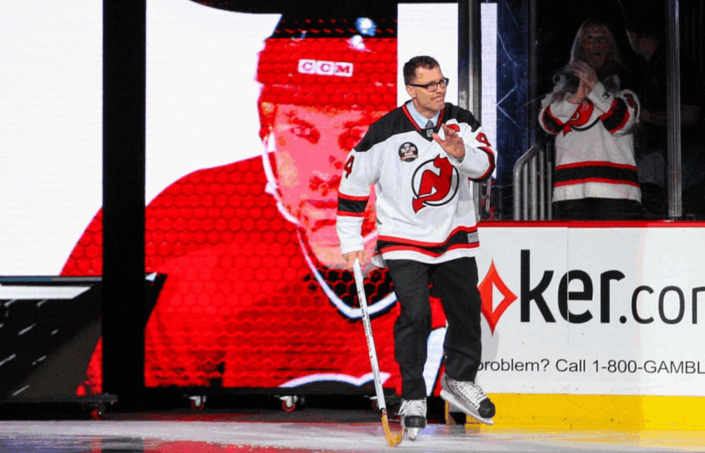 Mar 8, 2015; Newark, NJ, USA; New Jersey Devils captain of the 1995 Stanley Cup champion Scott Stevens (4) waves to the crowd before the game between the New Jersey Devils and the Philadelphia Flyers at Prudential Center. Mandatory Credit: Ed Mulholland-Imagn Images