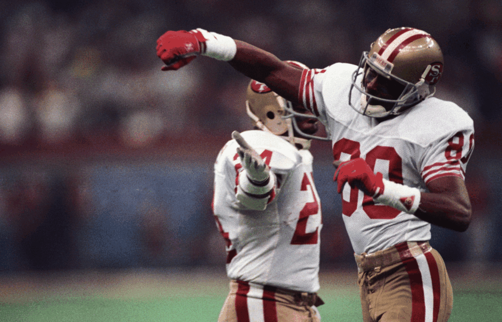 Jan 28, 1990; New Orleans, LA, USA; FILE PHOTO; San Francisco 49ers receiver Jerry Rice (80) reacts on the field against the Denver Broncos during Super Bowl XXIV at the Superdome. The 49ers defeated the Broncos 55-10. Mandatory Credit: Bob Deutsch-Imagn Images