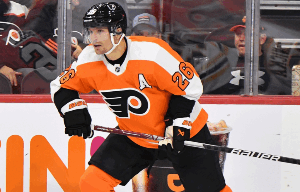 Sep 24, 2022; Philadelphia, Pennsylvania, USA; Philadelphia Flyers left wing Antoine Roussel (26) against the Boston Bruins during the second period at Wells Fargo Center. Mandatory Credit: Eric Hartline-Imagn Images