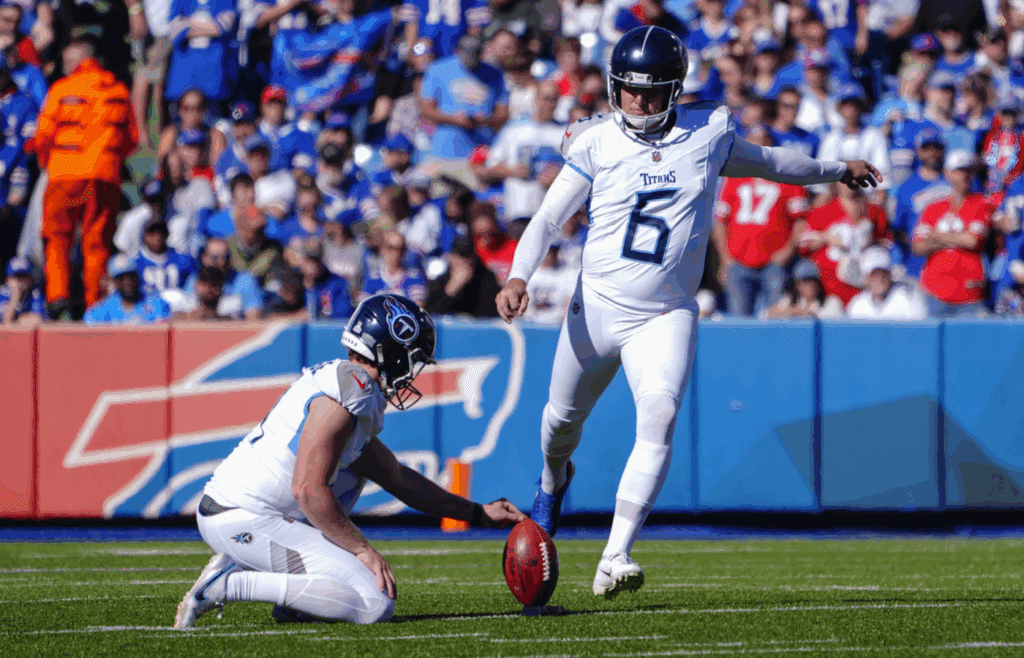 Oct 20, 2024; Orchard Park, New York, USA; Tennessee Titans place kicker Nick Folk (6) kicks a field goal against the Buffalo Bills during the first half at Highmark Stadium. Mandatory Credit: Gregory Fisher-Imagn Images