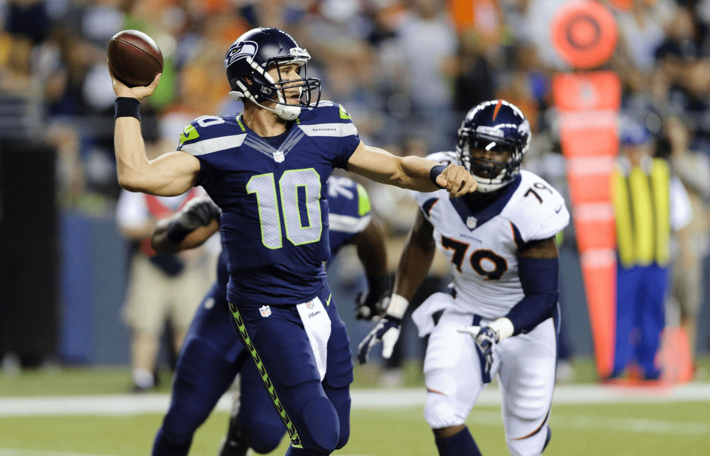 Aug 17, 2013; Seattle, WA, USA; Seattle Seahawks quarterback Brady Quinn (10) passes the ball during the 2nd half against the Denver Broncos at CenturyLink Field. Seattle defeated Denver 40-10. Mandatory Credit: Steven Bisig-Imagn Images