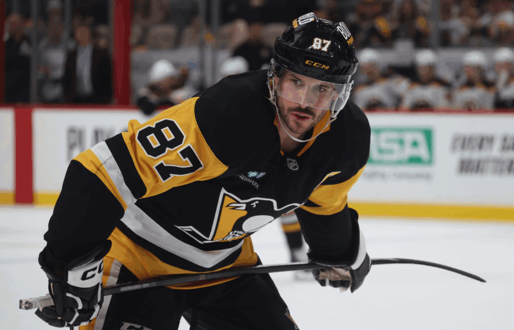 Apr 13, 2025; Pittsburgh, Pennsylvania, USA; Pittsburgh Penguins center Sidney Crosby (87) looks on before a face-off against the Boston Bruins during the third period at PPG Paints Arena. Mandatory Credit: Charles LeClaire-Imagn Images