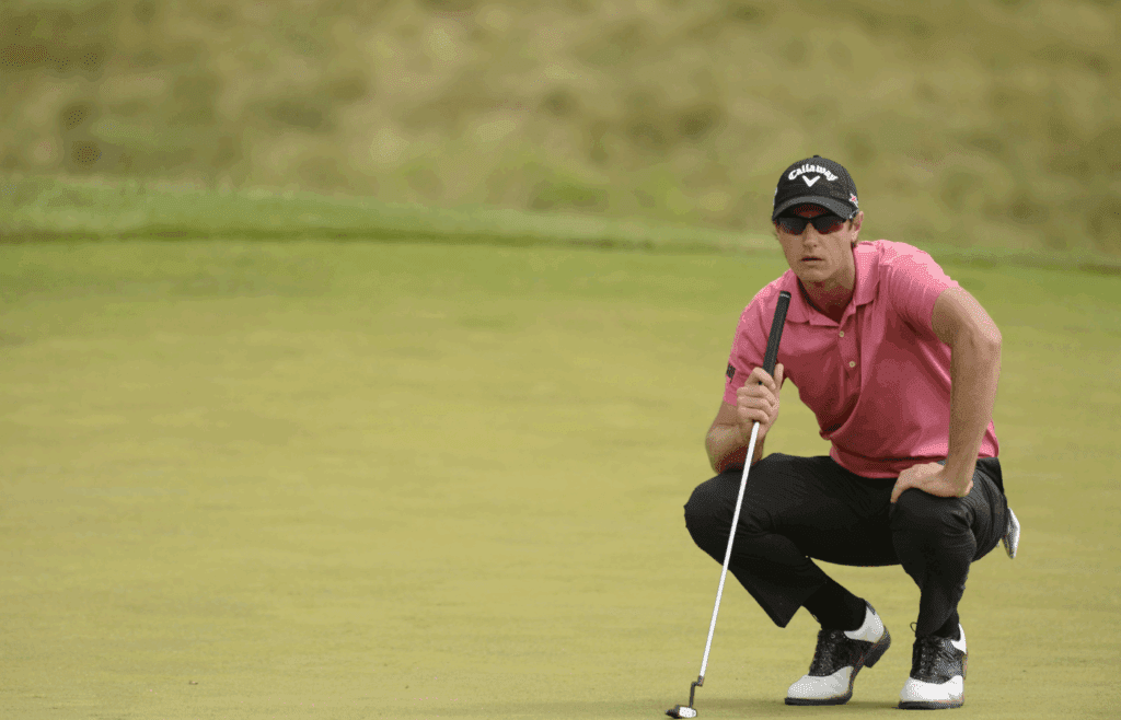 Jun 13, 2013; Ardmore, PA, USA; Nicolas Colsaerts lines up his putt on the 9th green during the first round of the 113th U.S. Open golf tournament at Merion Golf Club. Mandatory Credit: JD Mercer-Imagn Images