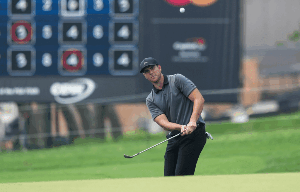 Apr 4, 2025; San Antonio, Texas, USA; Luke List chips onto the 18th green during the second round of the Valero Texas Open golf tournament. Mandatory Credit: Daniel Dunn-Imagn Images