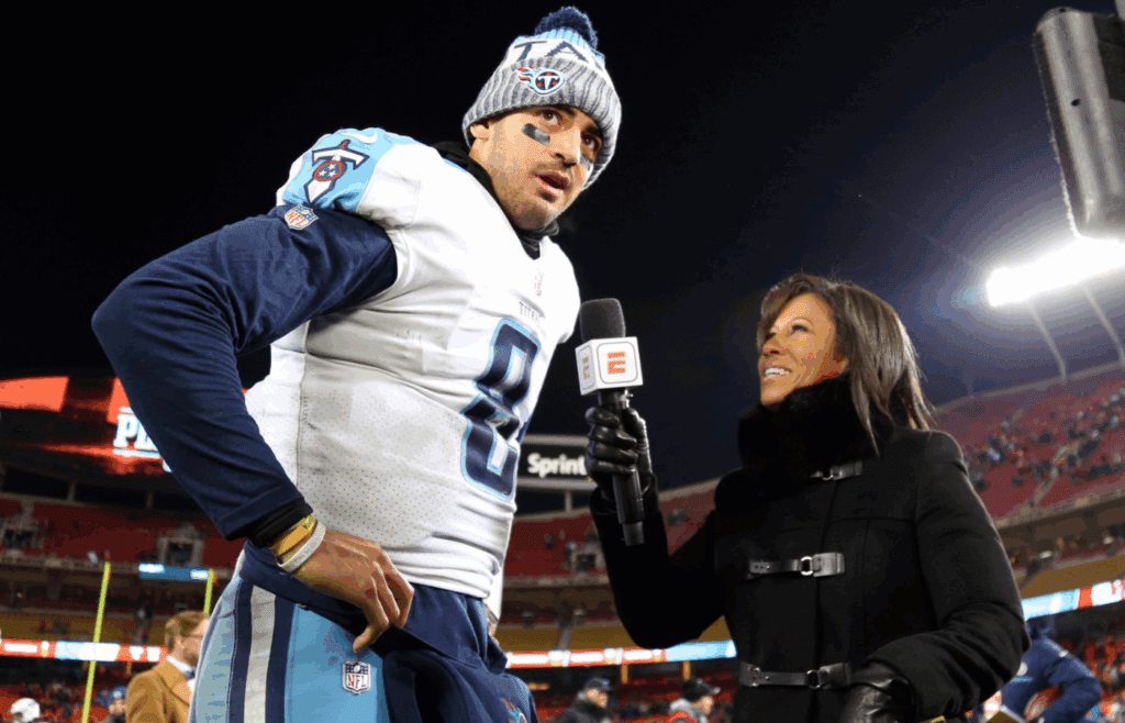 Jan 6, 2018; Kansas City, MO, USA; Tennessee Titans quarterback Marcus Mariota (8) is interviewed by ESPN reporter Lisa Salters after defeating the Kansas City Chiefs in the AFC Wild Card playoff football game at Arrowhead Stadium. Mandatory Credit: Jay Biggerstaff-Imagn Images