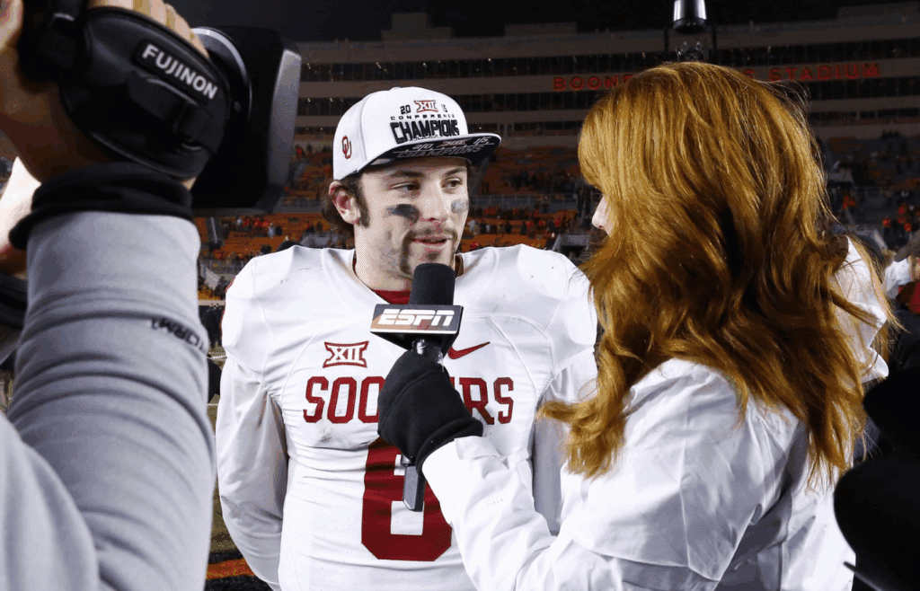 Nov 28, 2015; Stillwater, OK, USA; Oklahoma Sooners quarterback Baker Mayfield (6) is interviewed by ESPN after Oklahoma defeated the Oklahoma State Cowboys at Boone Pickens Stadium. Oklahoma won 58-23. Mandatory Credit: Alonzo Adams-Imagn Images