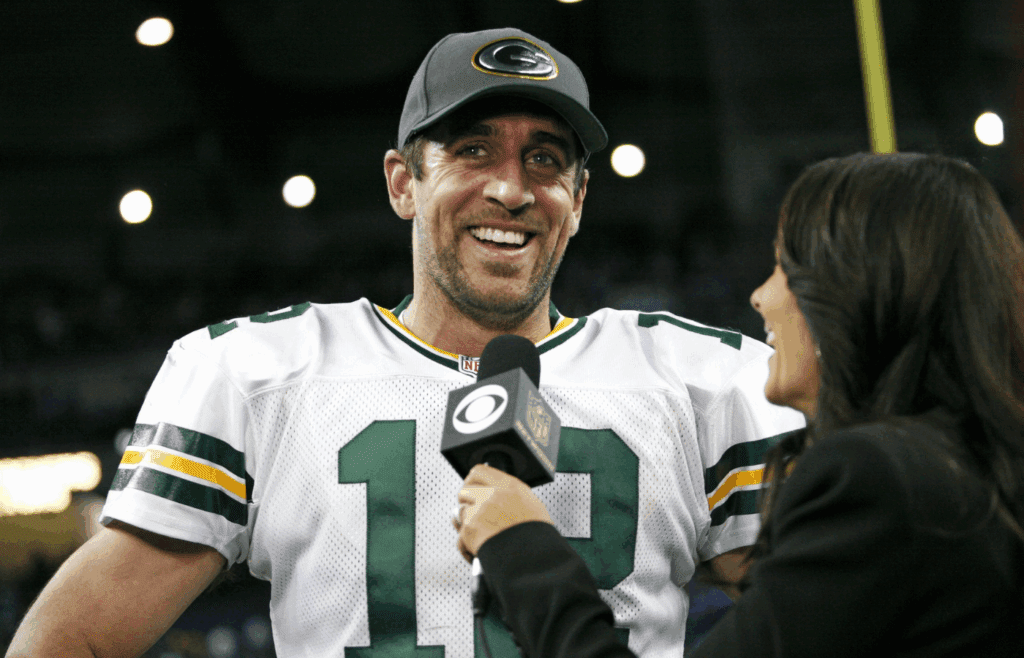 Dec 3, 2015; Detroit, MI, USA; Green Bay Packers quarterback Aaron Rodgers (12) smiles during his post game interview after the game against the Detroit Lions at Ford Field. Packers win 27-23. Mandatory Credit: Raj Mehta-Imagn Images