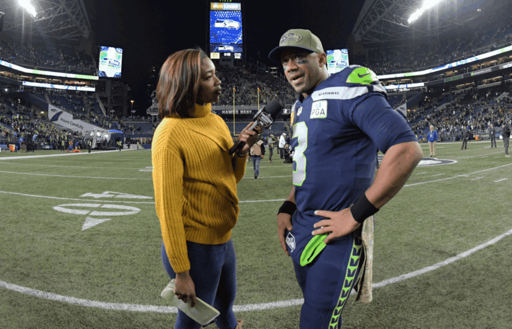 Nov 15, 2018; Seattle, WA, USA; Fox Sports sideline reporter Kristina Pink (left) interviews Seattle Seahawks quarterback Russell Wilson (3) after the game against the Green Bay Packers at CenturyLink Field. The Seahawks defeated the Packers 27-24. Mandatory Credit: Kirby Lee-Imagn Images