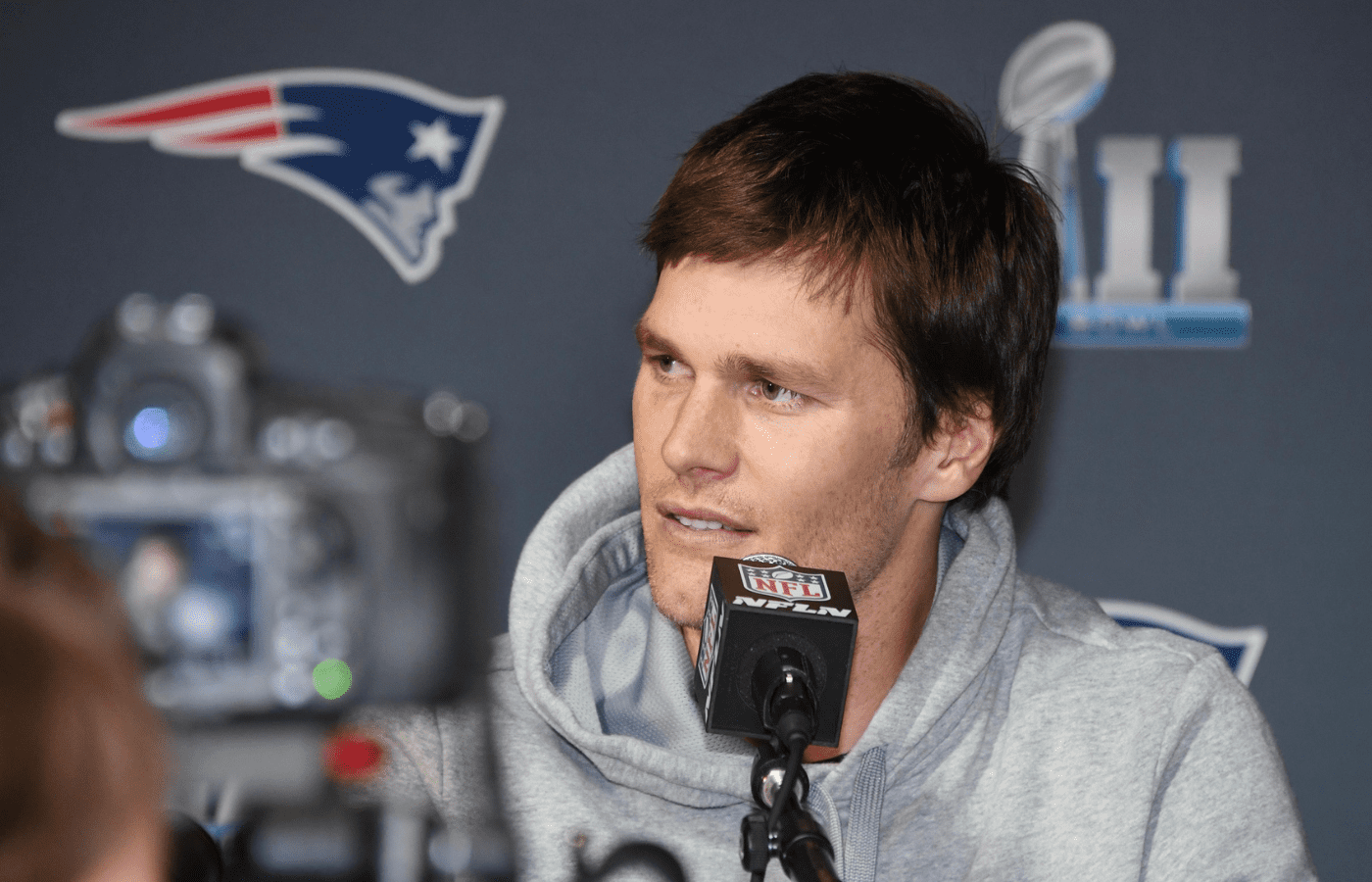 Jan 30, 2018; Bloomington, MN, USA; New England Patriots quarterback Tom Brady is interviewed during a press conference at the Mall of America in advance of Super Bowl LII against the Philadelphia Eagles at Mall of America. Mandatory Credit: Kirby Lee-Imagn Images