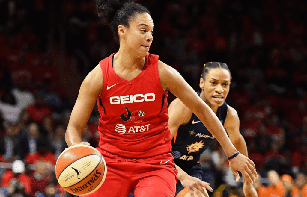 Oct 10, 2019; Washington, DC, USA; Washington Mystics guard Kristi Toliver (20) dribbles as Connecticut Sun guard Jasmine Thomas (5) chases during the second quarter in game five of the 2019 WNBA Finals at Entertainment and Sports Ar. Mandatory Credit: Brad Mills-Imagn Images