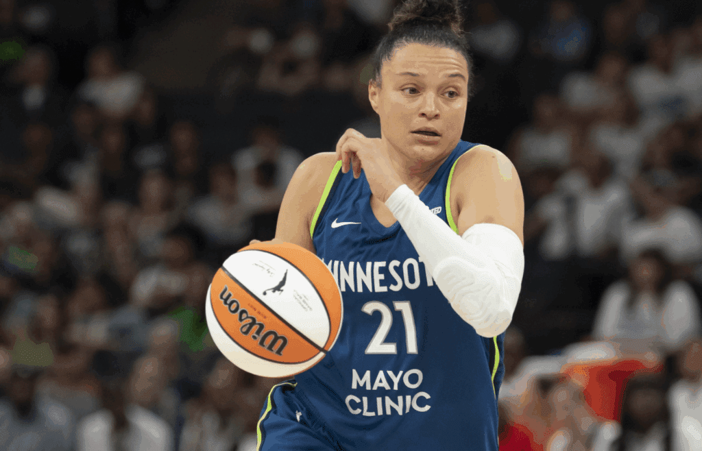 Jul 3, 2025; Minneapolis, Minnesota, USA; Minnesota Lynx guard Kayla McBride (21) dribbles the ball against the Washington Mystics in the second half at Target Center. Mandatory Credit: Jesse Johnson-Imagn Images