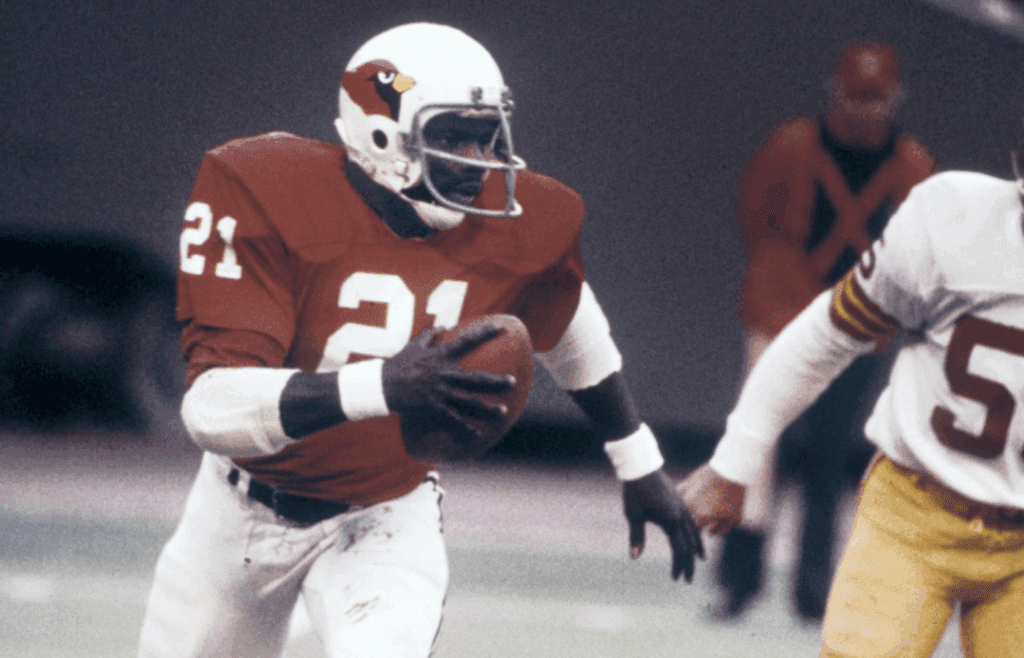 Nov 21, 1976; St. Louis, MO, USA; FILE PHOTO; St. Louis Cardinals running back Terry Metcalf (21) carries the ball against the Washington Redskins at Busch Stadium. Mandatory Credit: Herb Weitman-Imagn Images