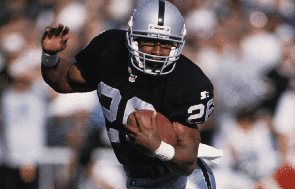 Nov 19, 1995; Oakland, CA, USA; FILE PHOTO; Oakland Raiders running back Napoleon Kaufman (26) in action against the Dallas Cowboys at Oakland-Alameda County Coliseum. Mandatory Credit: Peter Brouillet-USA TODAY NETWORK