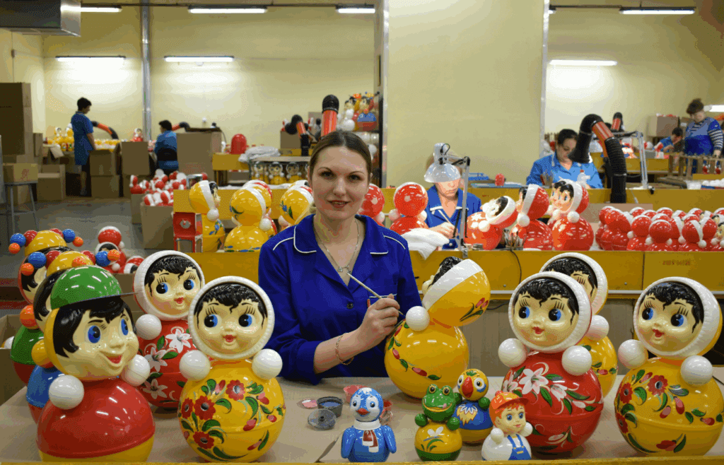 Woman Working in Toy Factory
