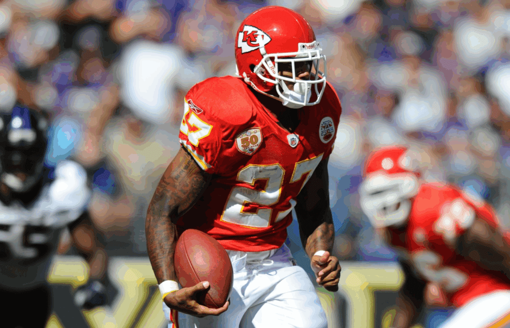 September 13, 2009; Baltimore, MD, USA; Kansas City Chiefs running back Larry Johnson (27) carries the ball in the fourth quarter against the Baltimore Ravens at M&T Bank Stadium. Baltimore defeated Kansas City 38-24. Mandatory Credit: James Lang-Imagn Images