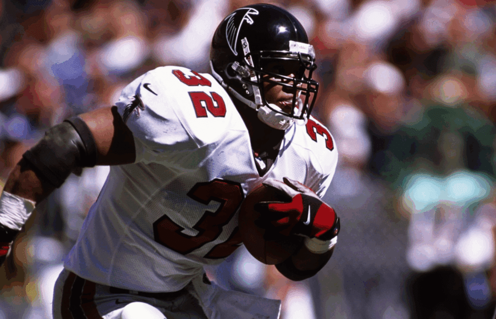Sep 10, 2000; Denver, CO, USA; FILE PHOTO; Atlanta Falcons running back Jamal Anderson (32) carries the ball against the Denver Broncos at Mile High Stadium. Mandatory Credit: Peter Brouillet-USA TODAY NETWORK