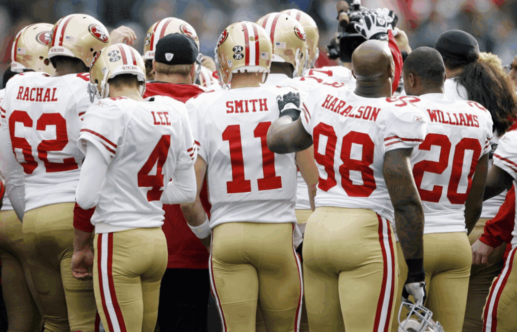 Dec 24, 2011, Seattle, WA, USA; San Francisco 49ers quarterback Alex Smith (11) and his teammates finish pregame warmups against the Seattle Seahawks at CenturyLink Field. Mandatory Credit: Joe Nicholson-Imagn Images