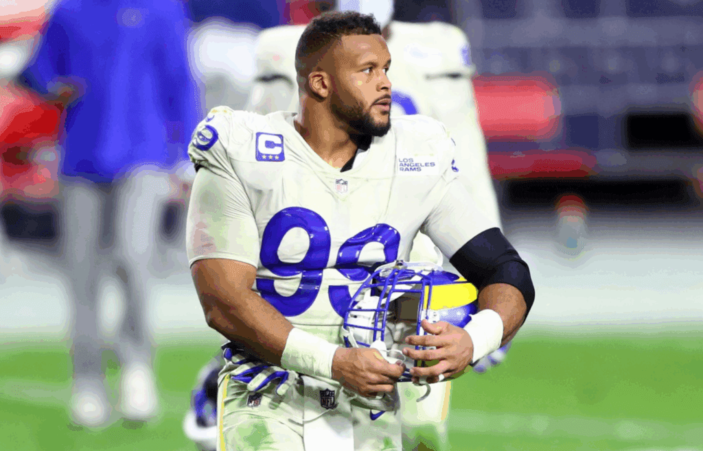 Dec 6, 2020; Glendale, Arizona, USA; Los Angeles Rams defensive tackle Aaron Donald (99) against the Arizona Cardinals at State Farm Stadium. Mandatory Credit: Mark J. Rebilas-Imagn Images