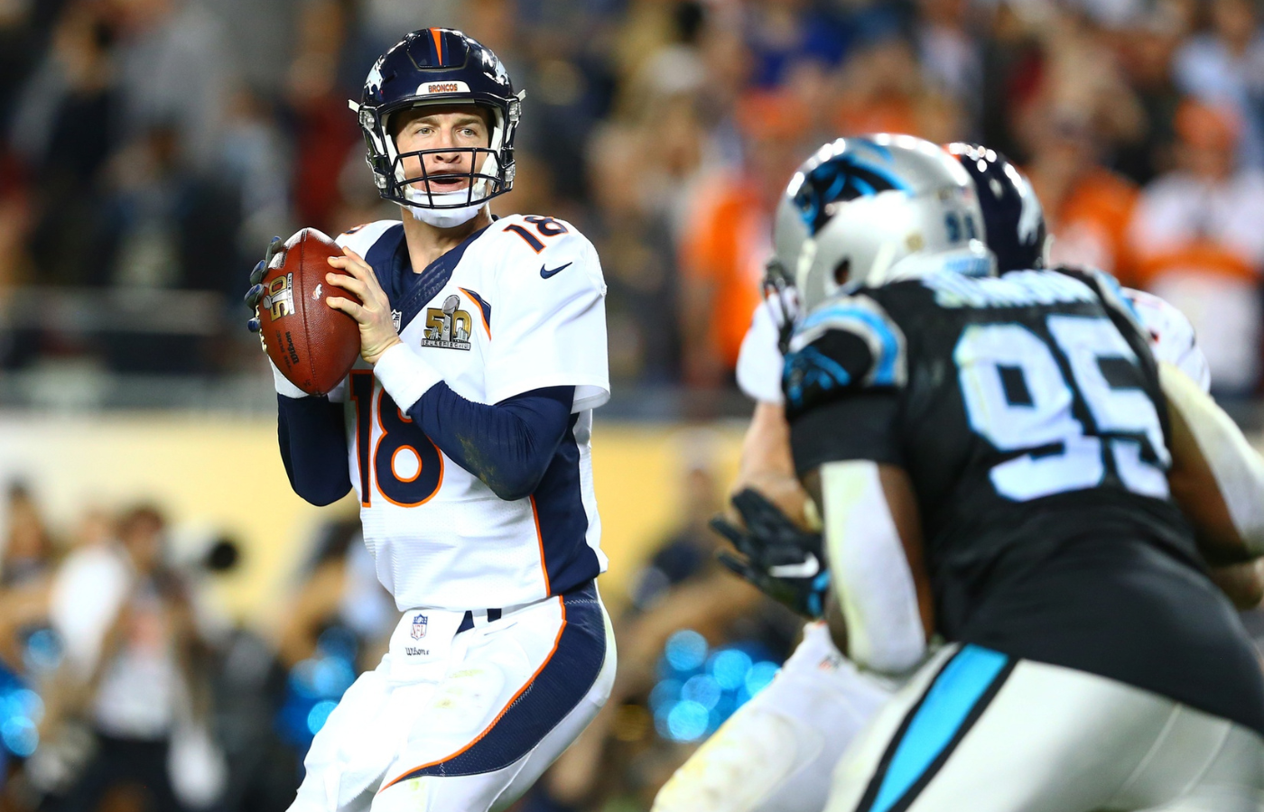Feb 7, 2016; Santa Clara, CA, USA; Denver Broncos quarterback Peyton Manning (18) drops pack to pass during a two-point conversion against the Carolina Panthers in the fourth quarter in Super Bowl 50 at Levi's Stadium. It was his final pass of the game. Mandatory Credit: Mark J. Rebilas-Imagn Images