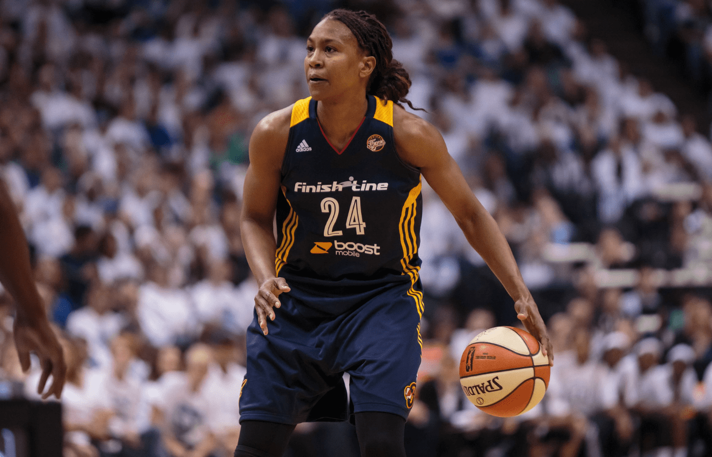 Oct 14, 2015; Minneapolis, MN, USA; Indiana Fever forward Tamika Catchings (24) dribbles in the second quarter against the Minnesota Lynx at Target Center. Mandatory Credit: Brad Rempel-Imagn Images