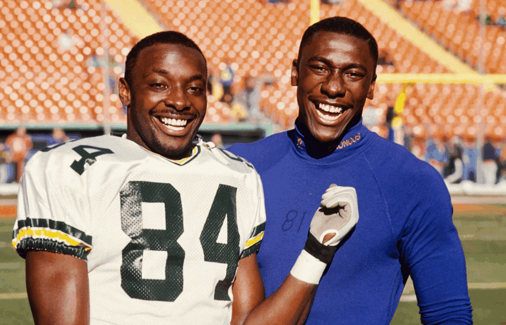 Dec 30, 1990; Denver, CO, USA; FILE PHOTO; Green Bay Packers receiver Sterling Sharpe (left) poses with his younger brother Denver Broncos receiver Shannon Sharpe (right) at Mile High Stadium. Mandatory Credit: Tony Tomsic-USA TODAY NETWORK